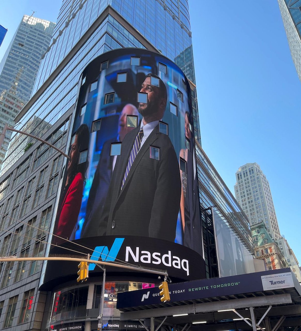 Veera B. Budhi featured on the Nasdaq MarketSite billboard in Times Square, New York